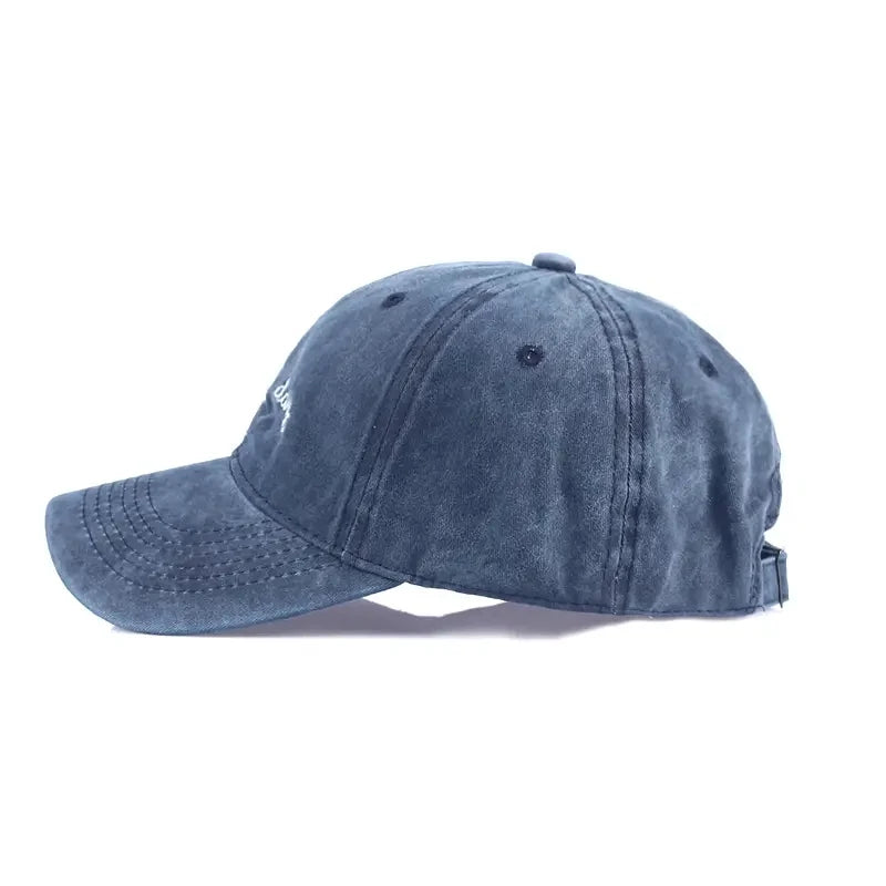 Navy Blue cap, with "bad hair day" embroidered on it