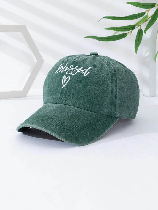 Green cotton cap, with "Blessed" embroided on it
