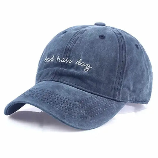 Navy Blue cap, with "bad hair day" embroidered on it 